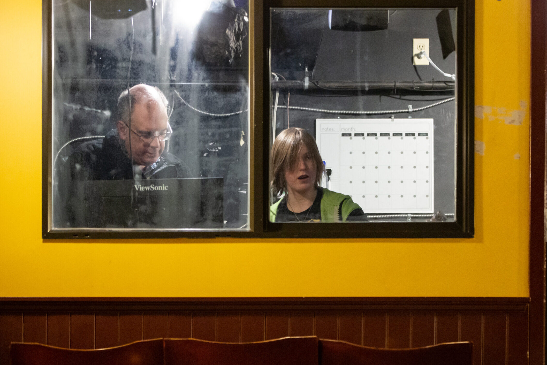 Photo of Michael Gurney and student in the tech booth at Heritage Playhouse